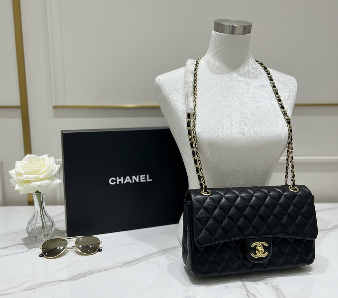 CHANE   JUMBO CLASSIC DOUBLE FLAP BAG IN BLACK QUILTED LAMBSKIN WITH GOLD-TONE HARDWARE