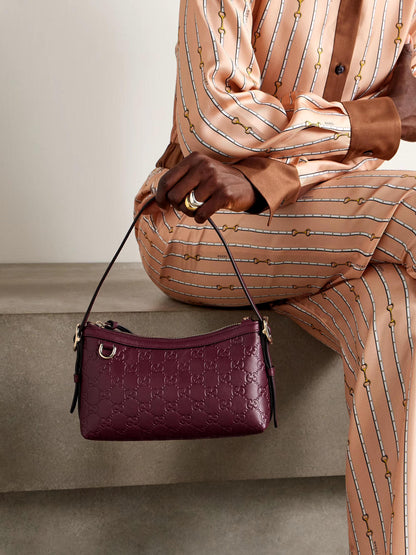 Gucci GG Embossed Mini Shoulder Bag